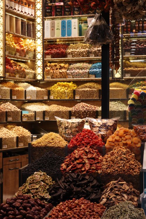 Free A colorful display of dried fruits and nuts at an outdoor market in Kayseri, Türkiye. Stock Photo