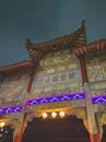 Illuminated Traditional Chinese Archway at Night