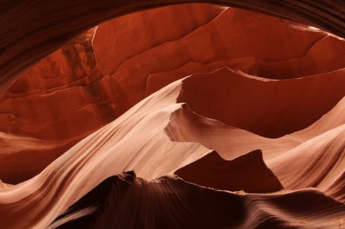 Gratis arkivbilde med abstrakt, antelope canyon, brun bakgrunn