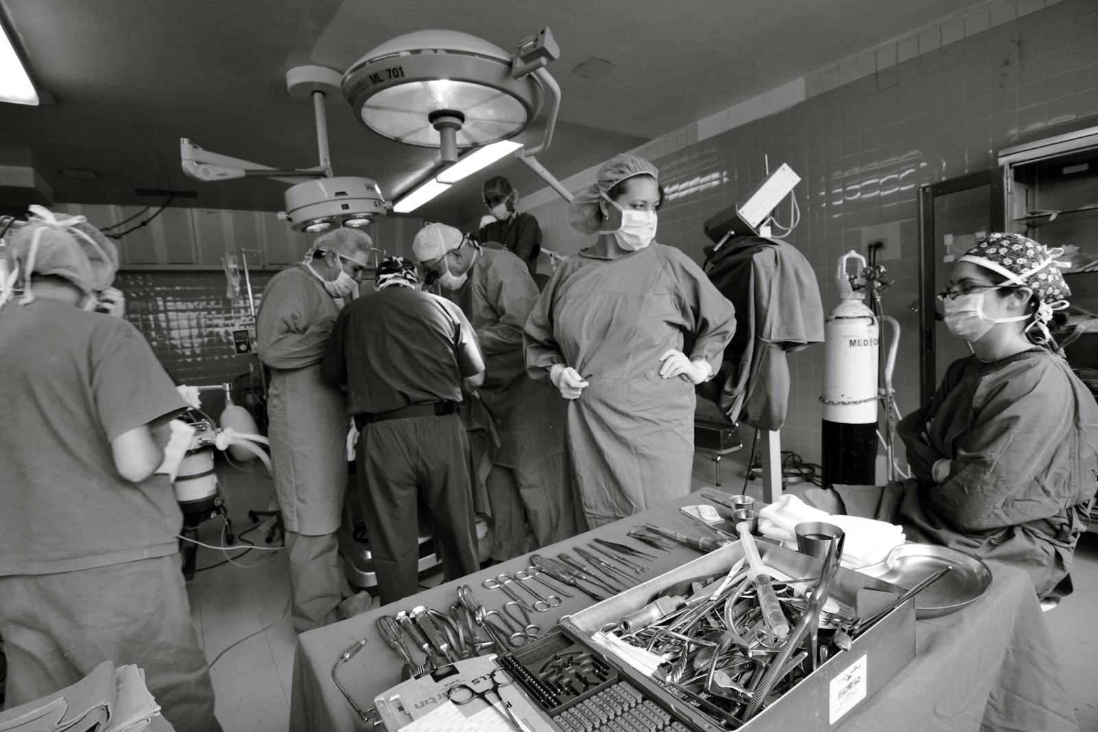 Medical team performing a procedure in an operating room