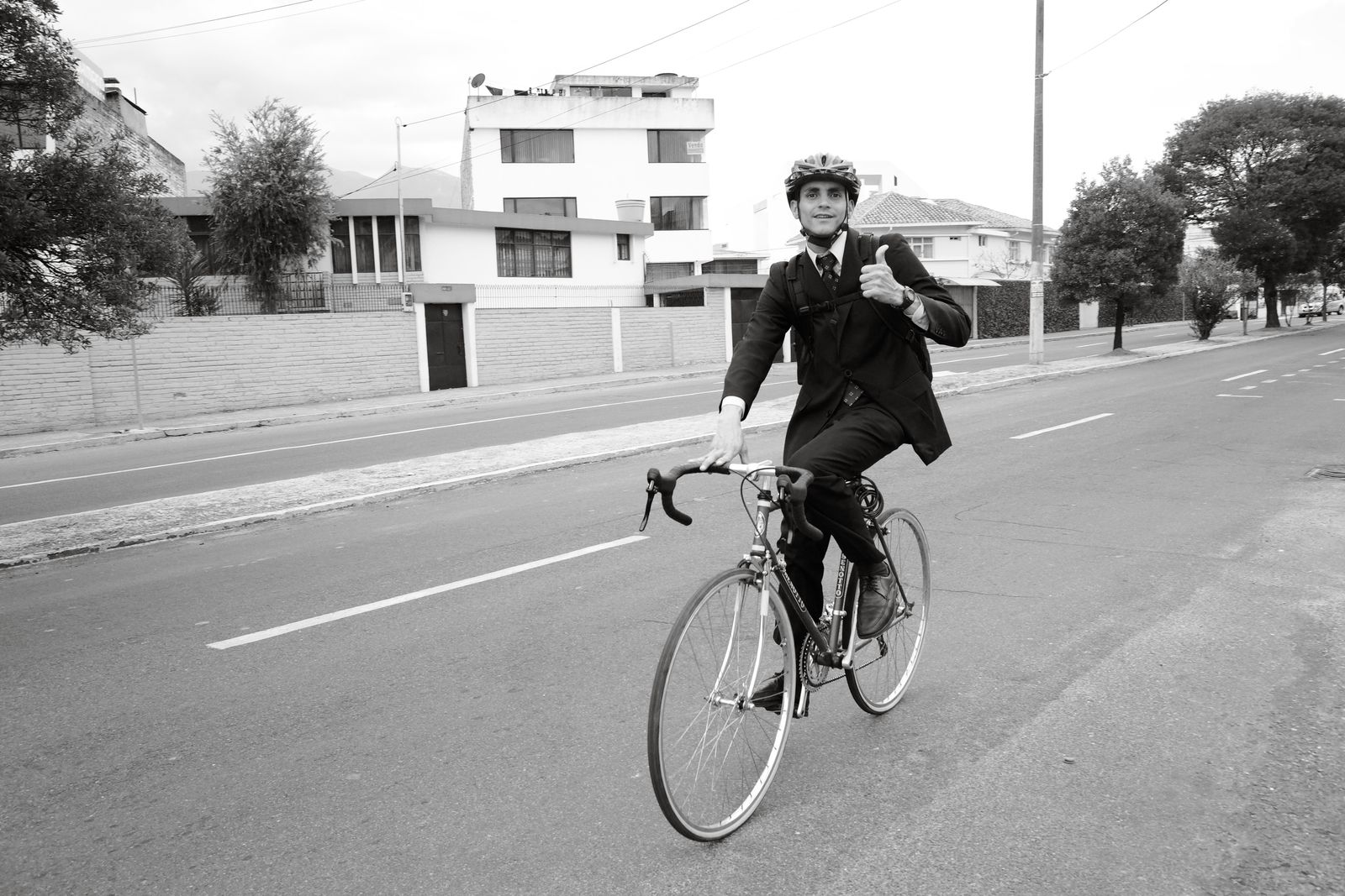 Urban cyclist commuting through the city with everyday riding gear