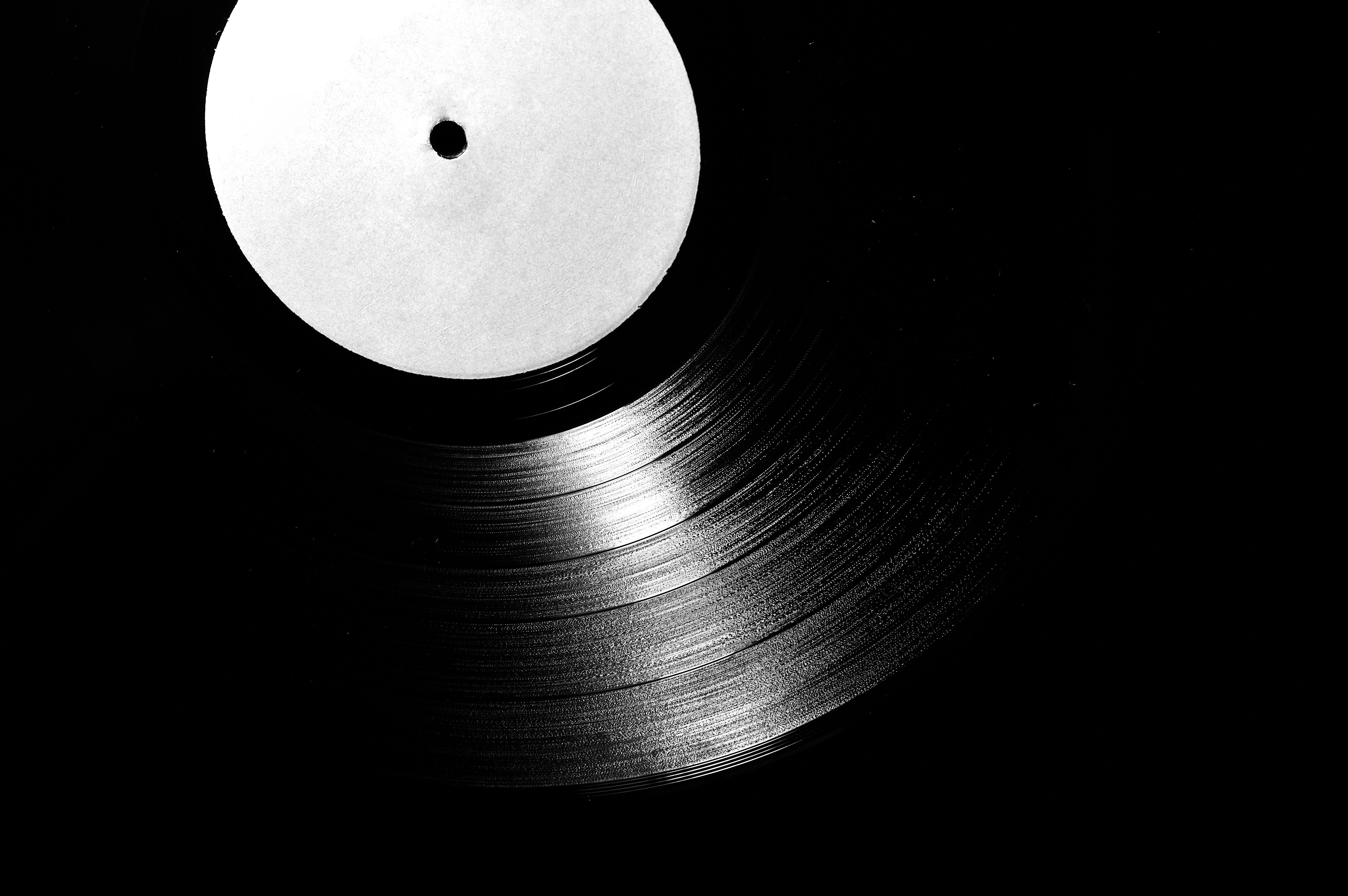 Black vinyl record on vinyl record photo – Free Grey Image on Unsplash