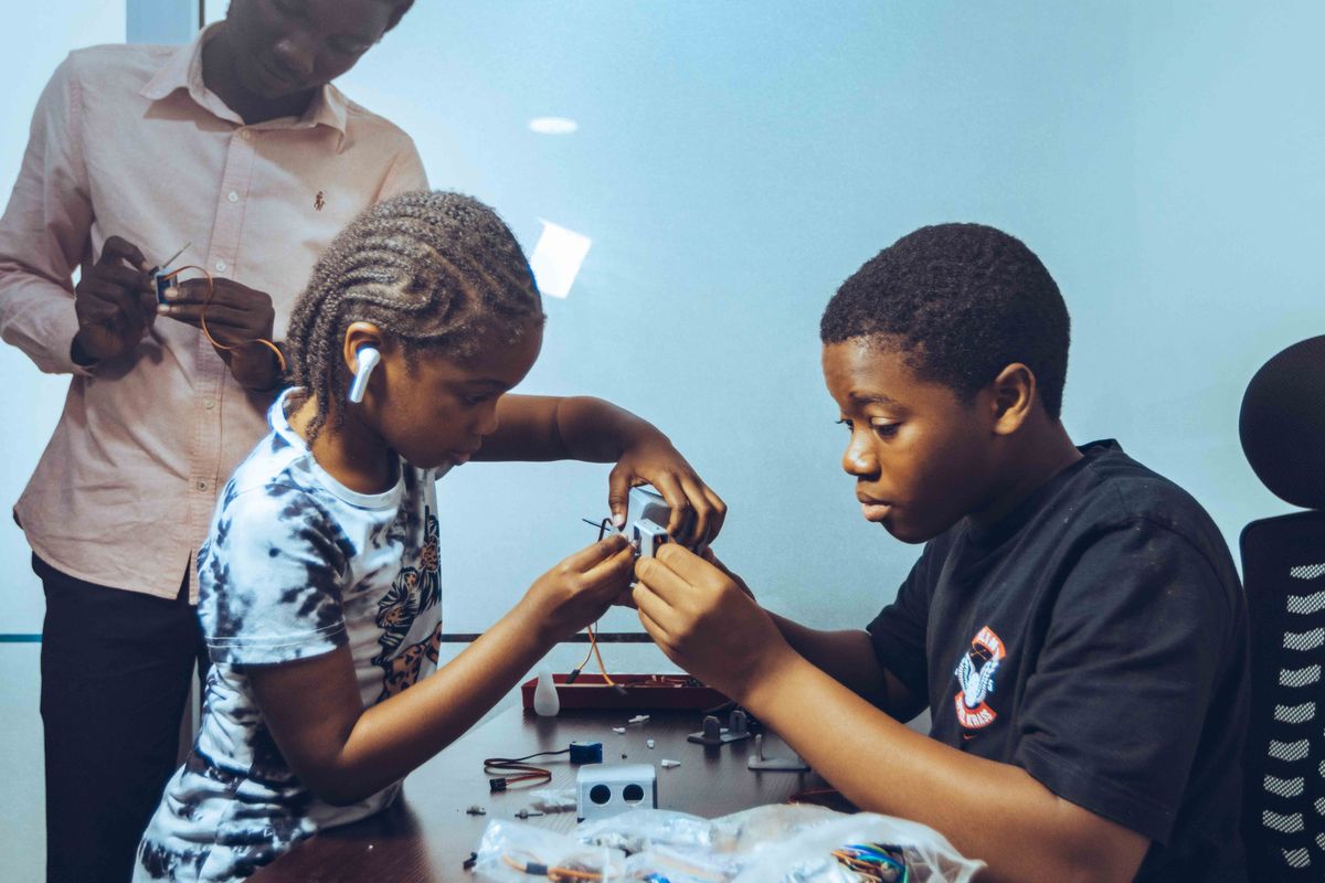 African learners collaborating on a STEM project in a classroom