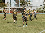 Amateur Football Players on Outdoor Field