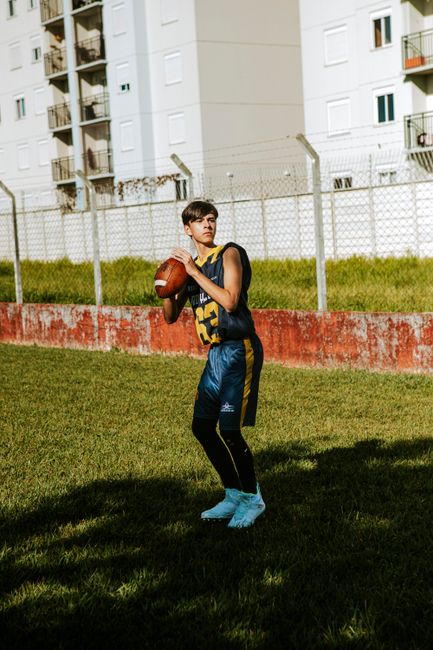 american football throwing outdoor training