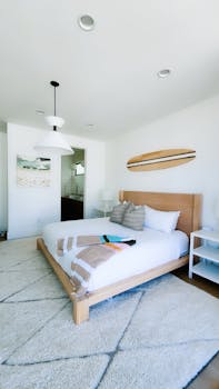 Bright modern bedroom in a St. George vacation rental with stylish decor.