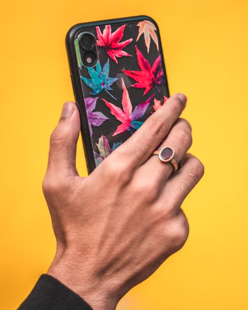 Free Person Holding Smartphone Stock Photo