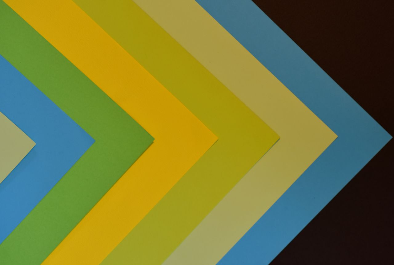 vibrant abstract design featuring a colorful chevron pattern with laye