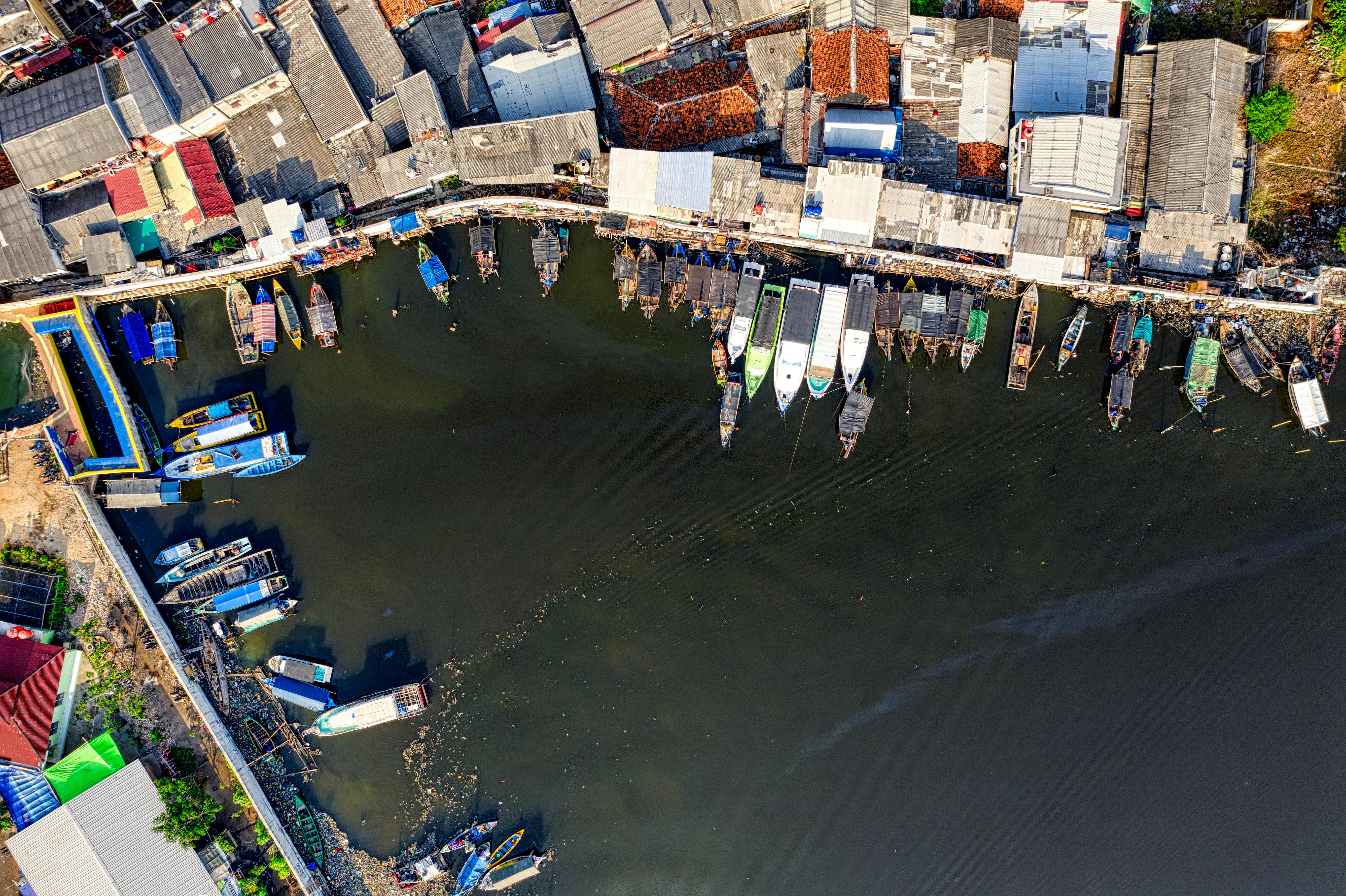 high angle photo of boats on body of water