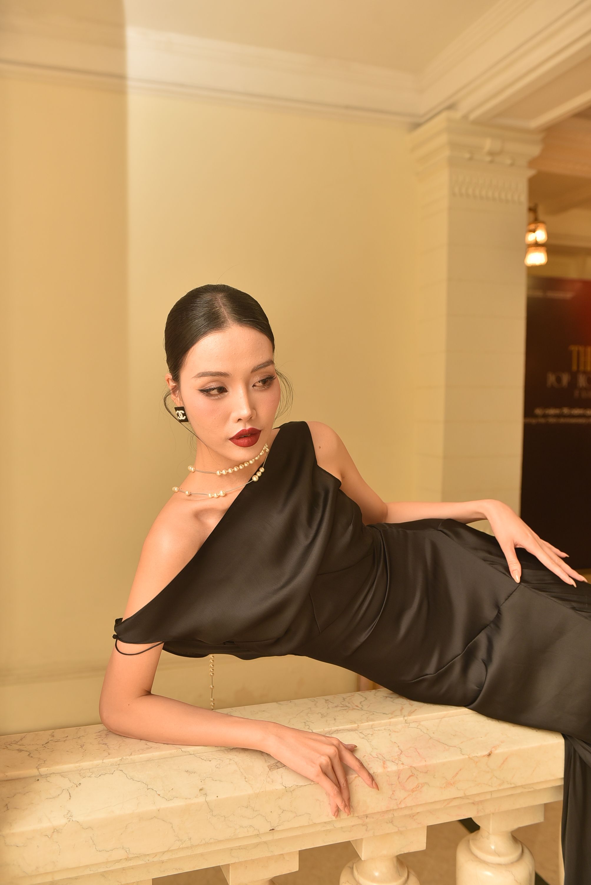 Elegant Woman in Black Dress at Formal Event · Free Stock Photo
