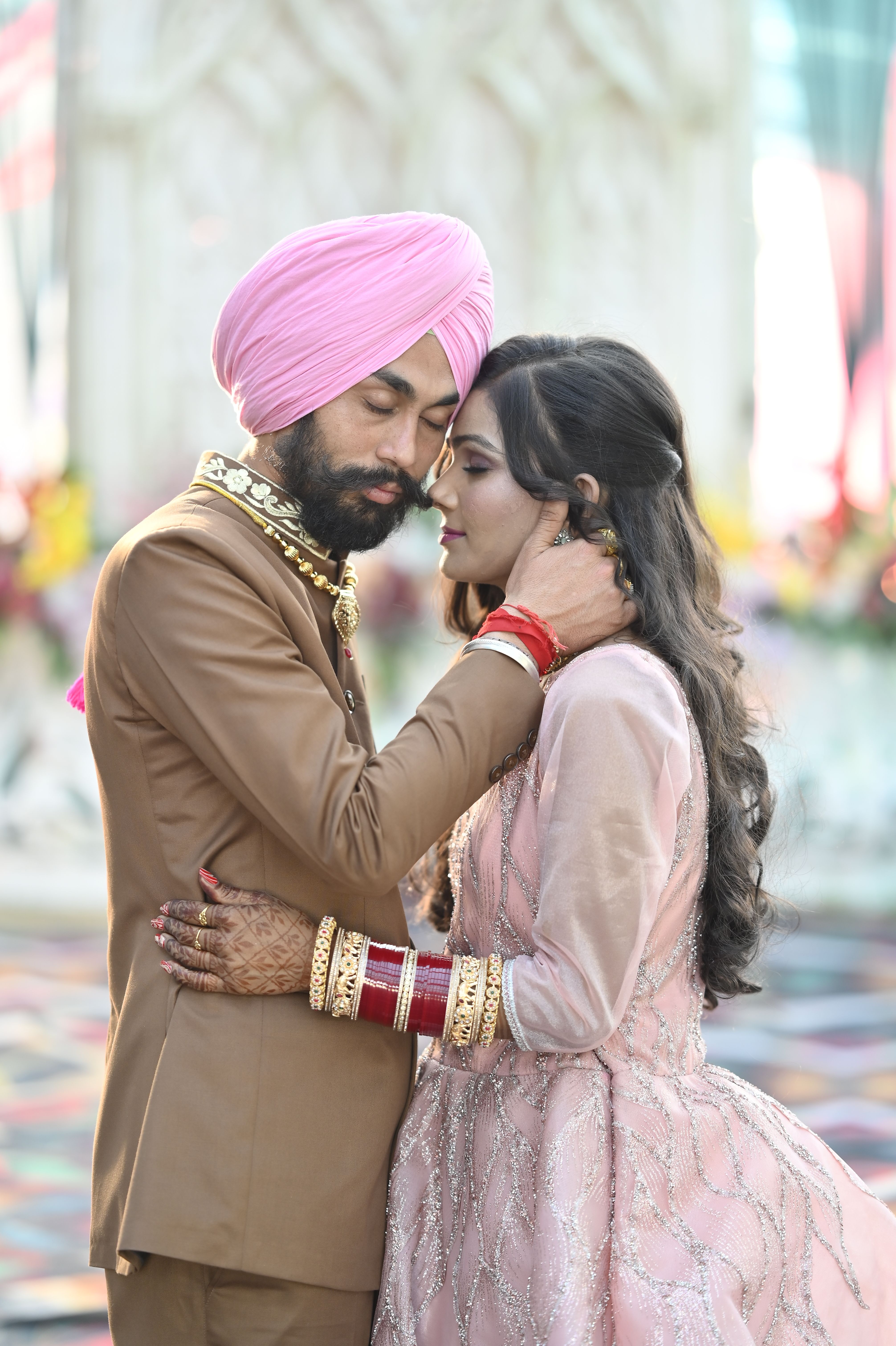 Romantic Indian Couple Embracing in Traditional Attire · Free Stock Photo