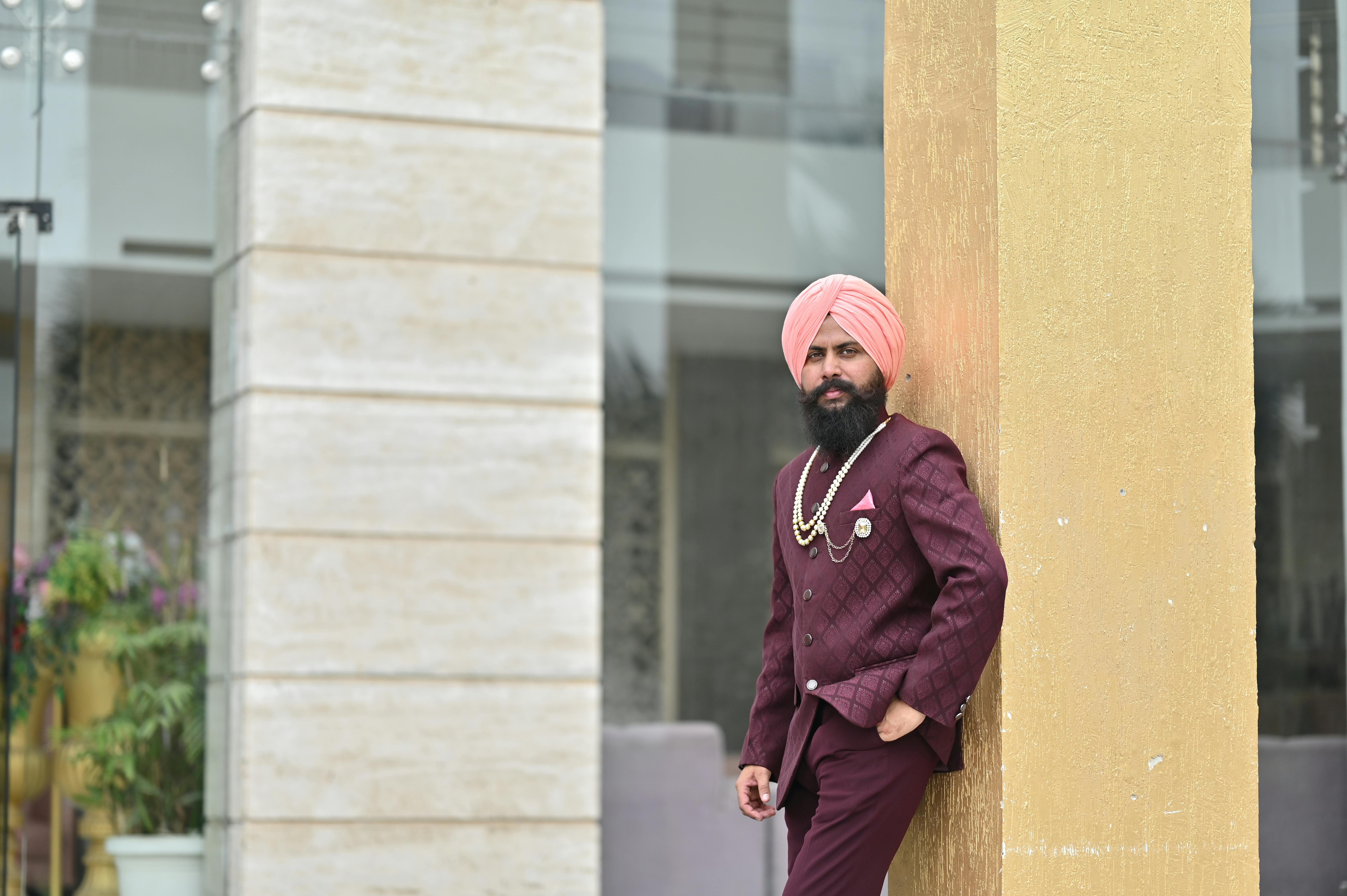 Maroon attire with turban