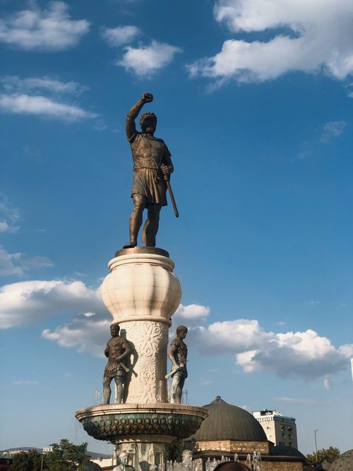 Free Majestic statue of Alexander the Great in Skopje against a bright blue sky. Stock Photo