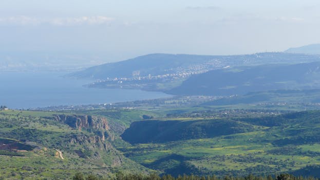 A breathtaking landscape of the lush green hills and Sea of Galilee in Israel.