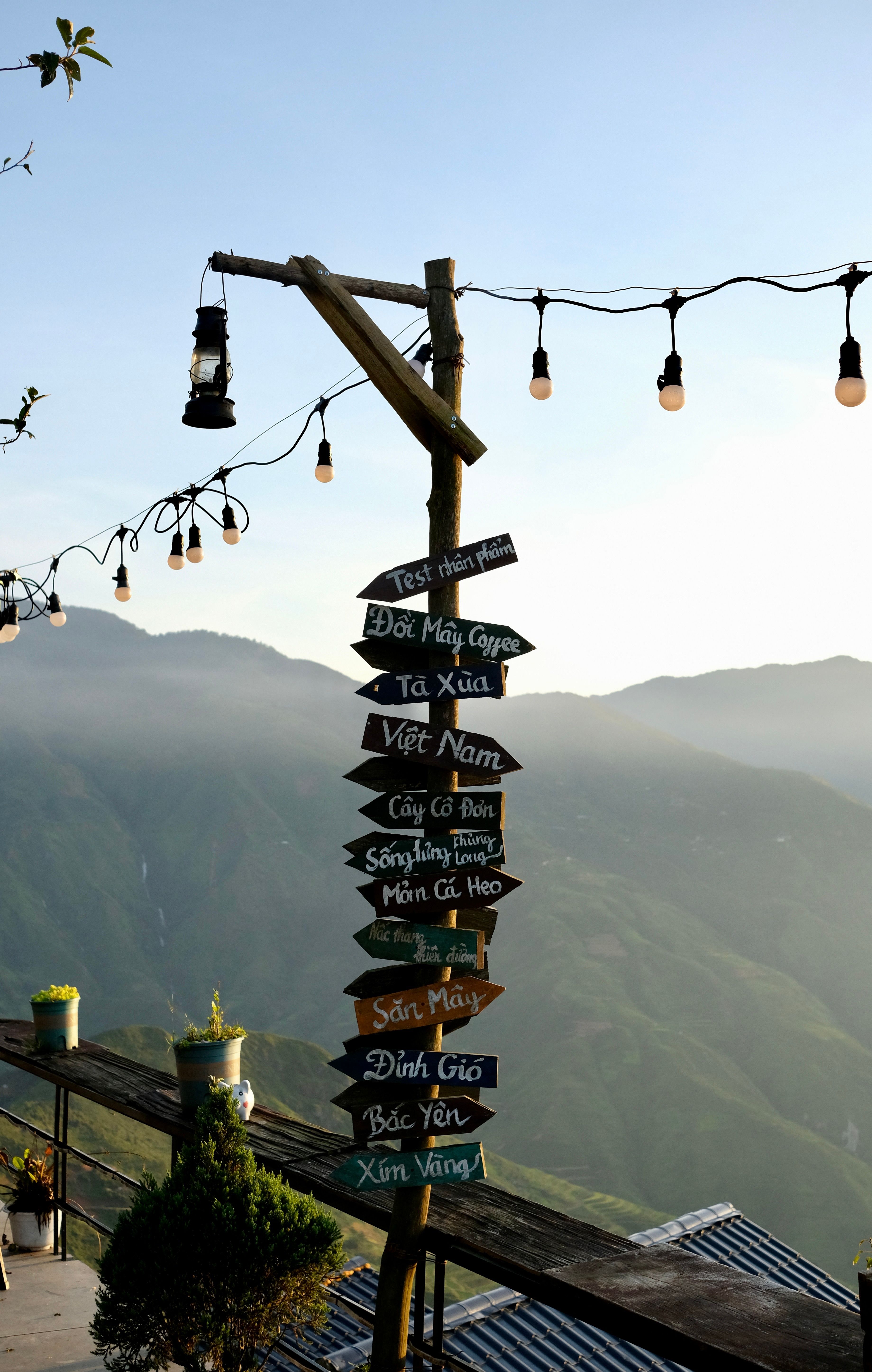 Wooden Signages in Green Mountains · Free Stock Photo