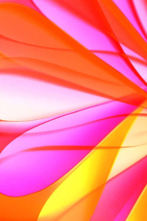 Free Vivid abstract image of colorful light patterns creating a striking visual with pink, orange, and yellow hues. Stock Photo