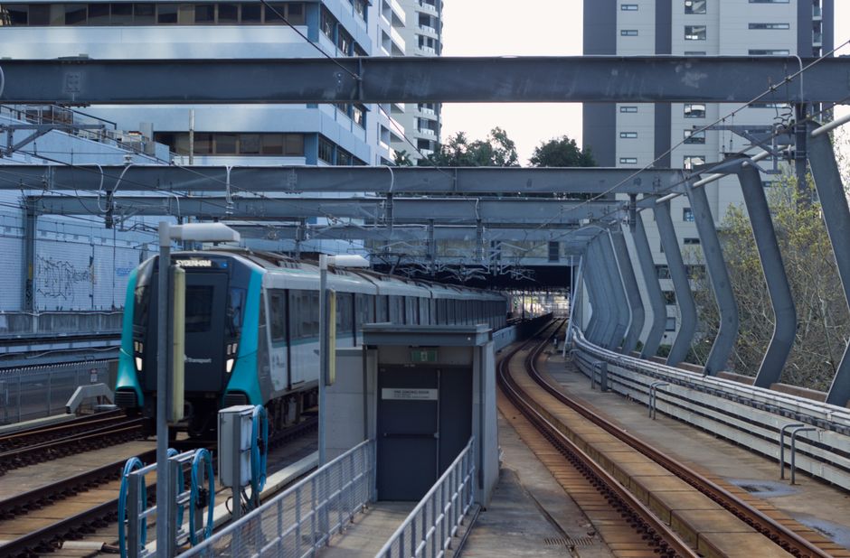 The Airport Link train station at Sydney Airport, Australia, with a train arriving.