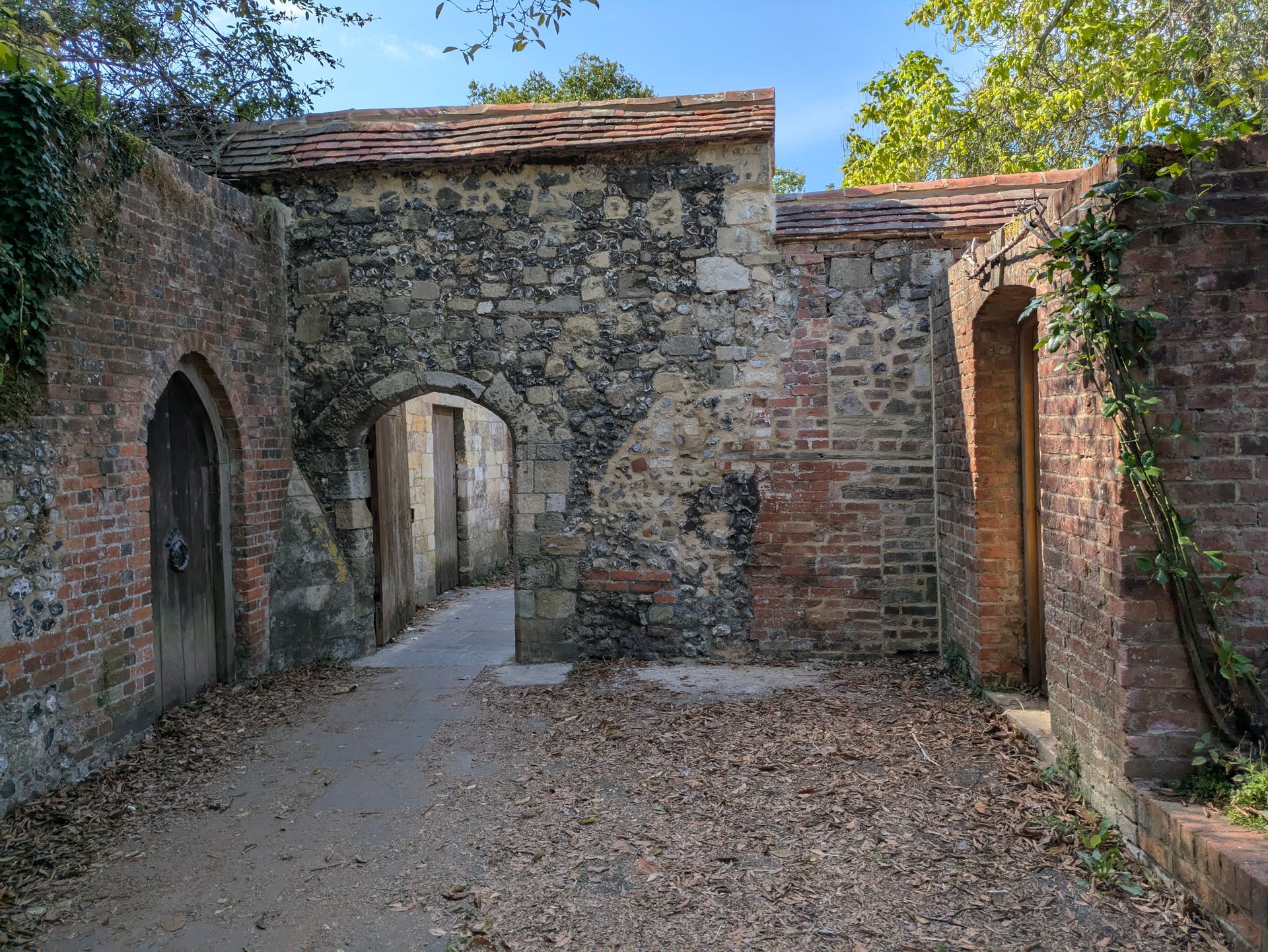 Explore the timeless charm of ancient stone ruins with weathered arches and rustic brick walls.