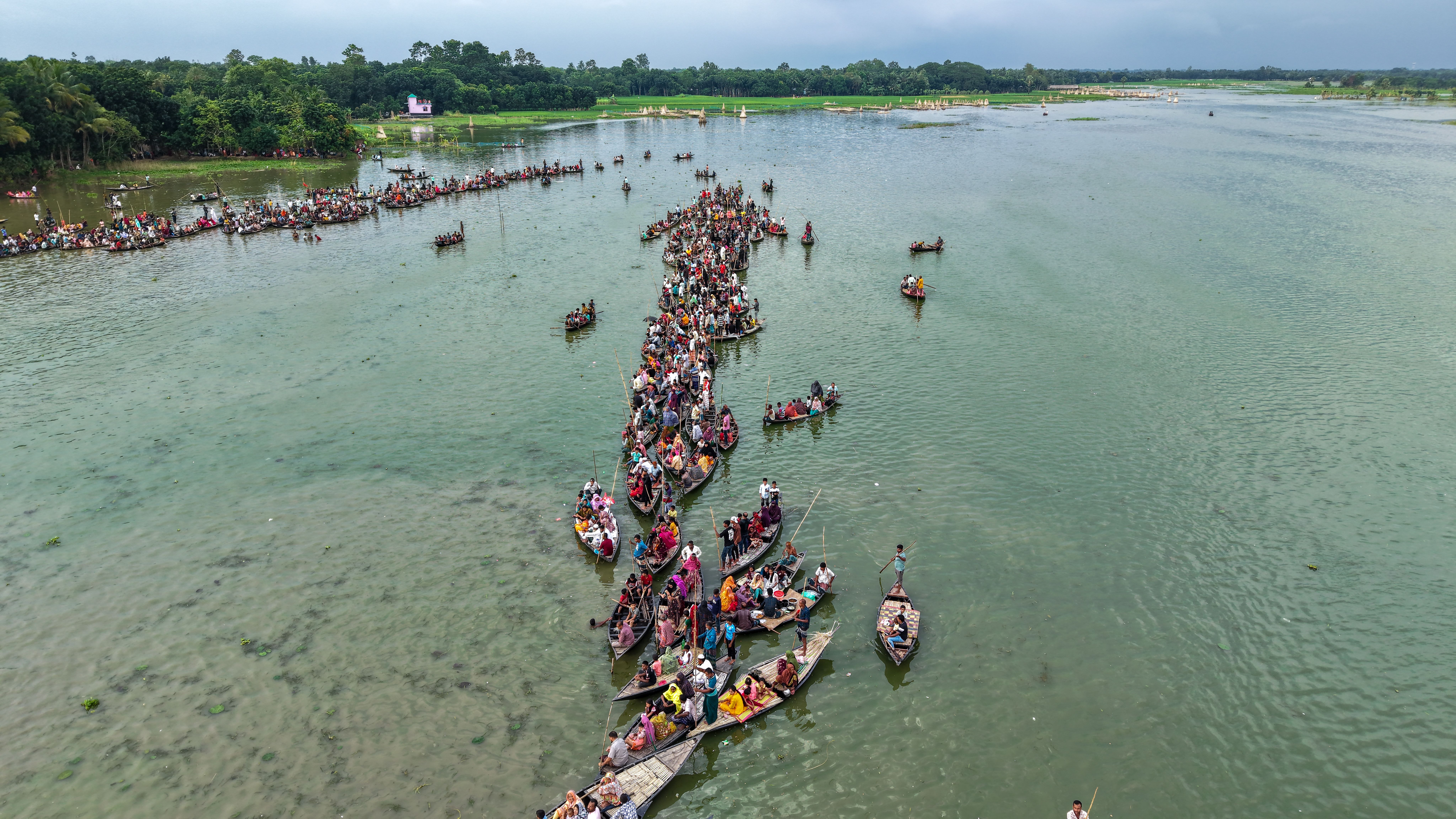 Aerial View of Traditional Boat Race with Spectators · Free Stock Photo