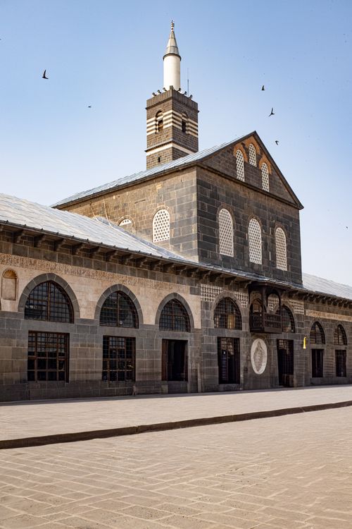 Free The Grand Mosque of Diyarbakır stands majestic with its unique architecture, captured on a sunny day. Stock Photo