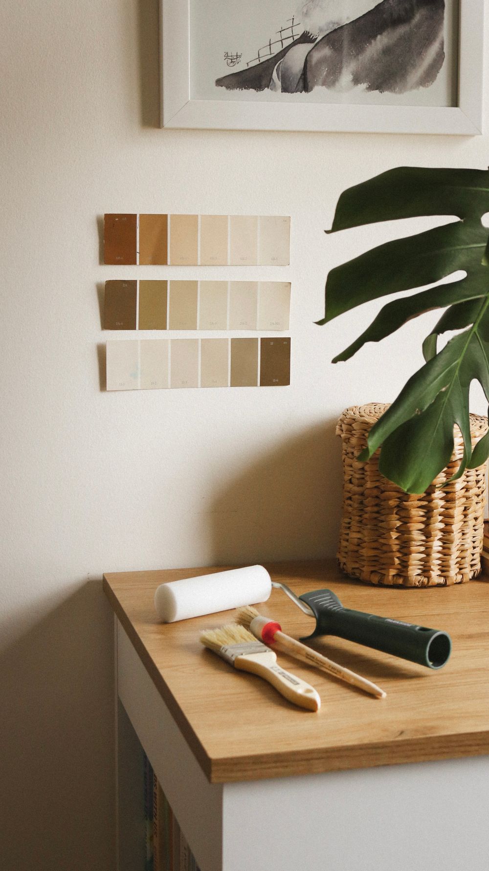 Paint samples and brushes in a room