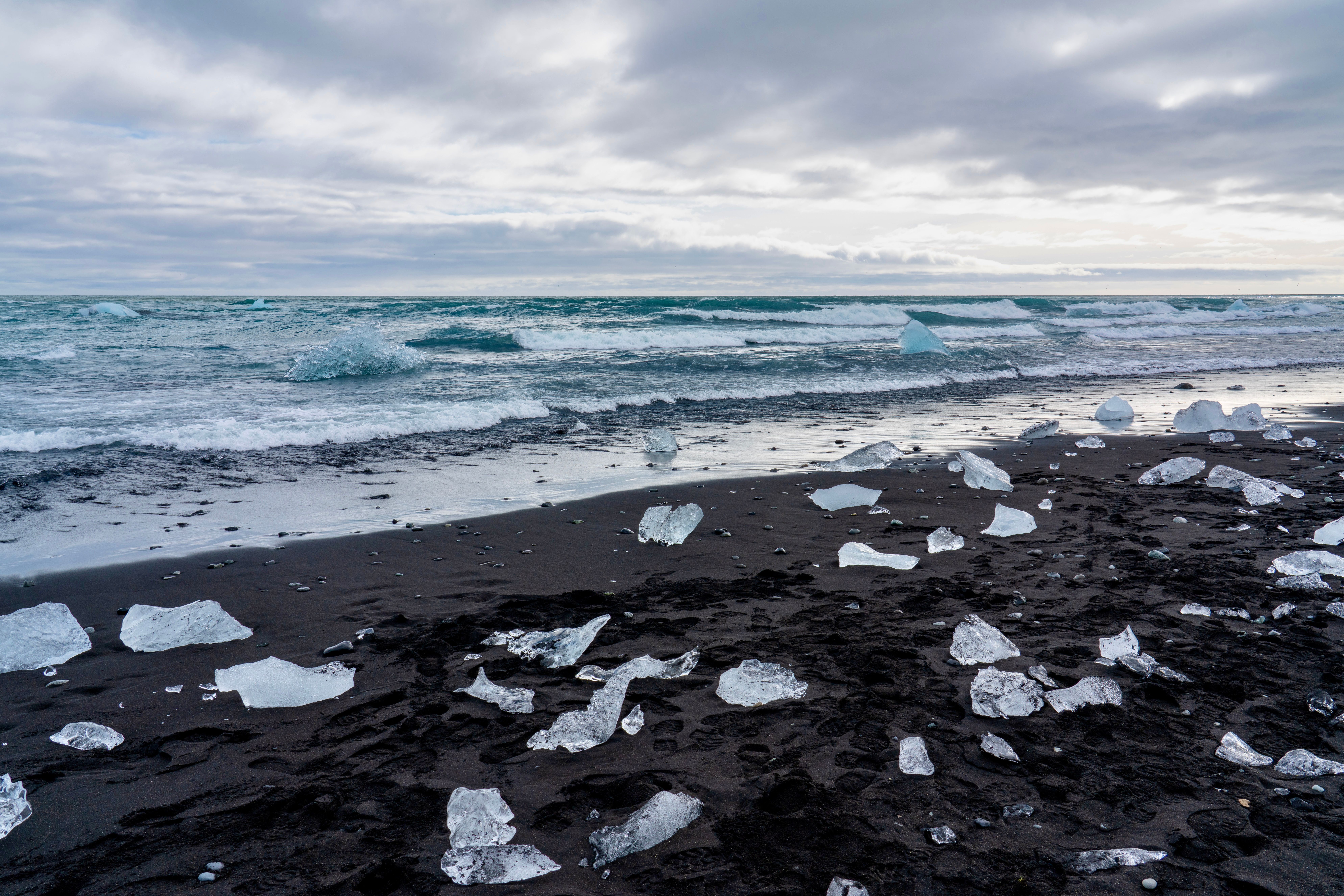diamond beach iceland black sand ice chunks icebergs washed ashore atlantic ocean