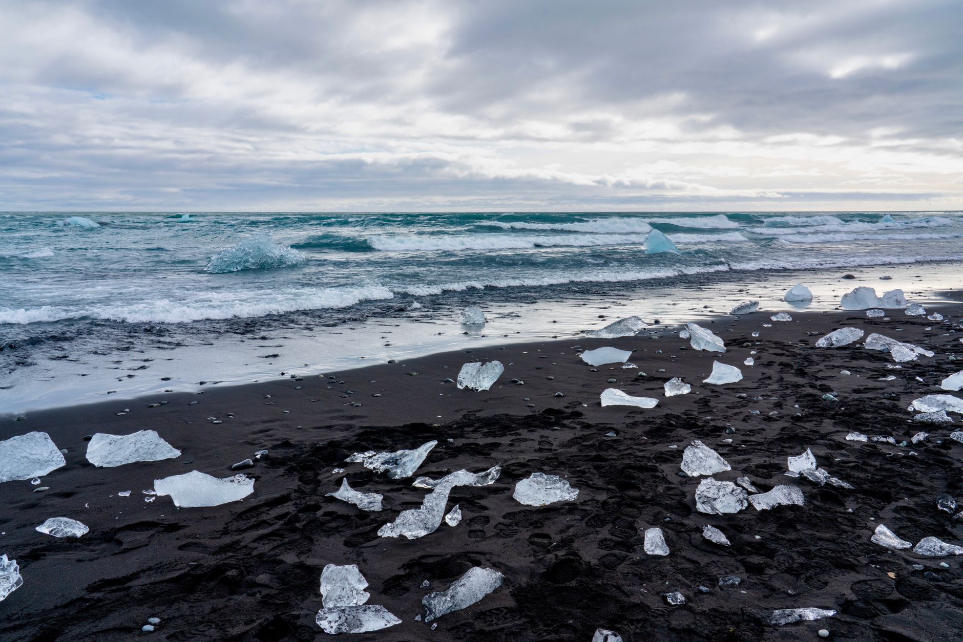 diamond beach iceland black sand ice chunks icebergs washed ashore atlantic ocean