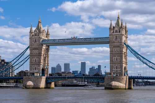 Free Iconic Tower Bridge over the River Thames in London on a clear day with blue skies. Stock Photo
