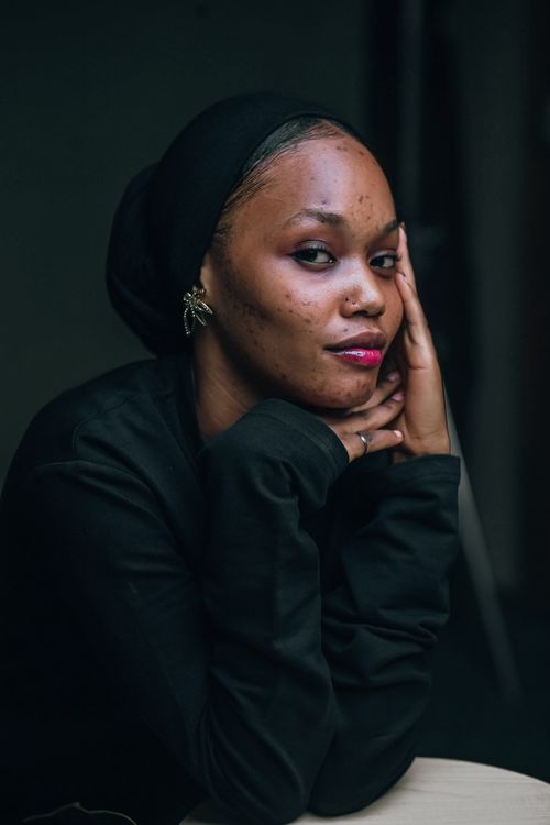 Free Elegant portrait of a young Nigerian woman in traditional attire with a serene expression. Stock Photo