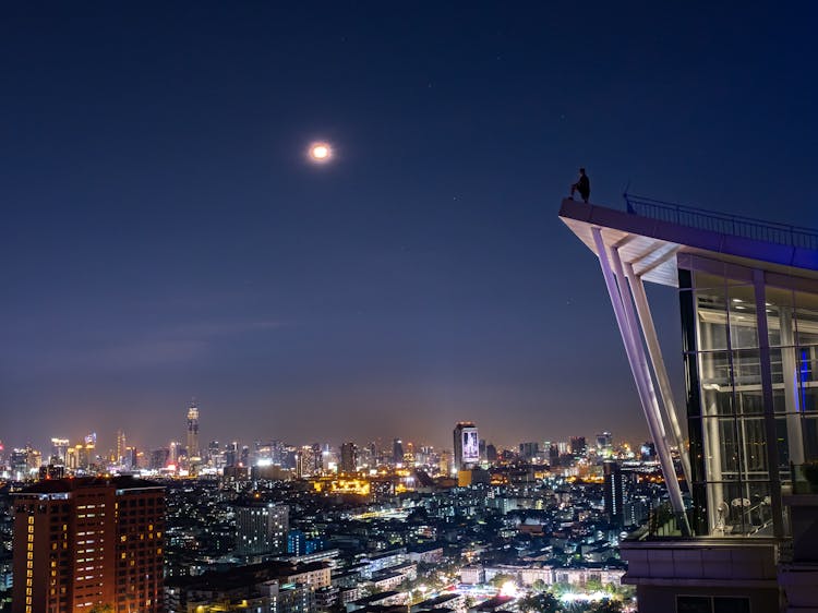 City Buildings During Night Time