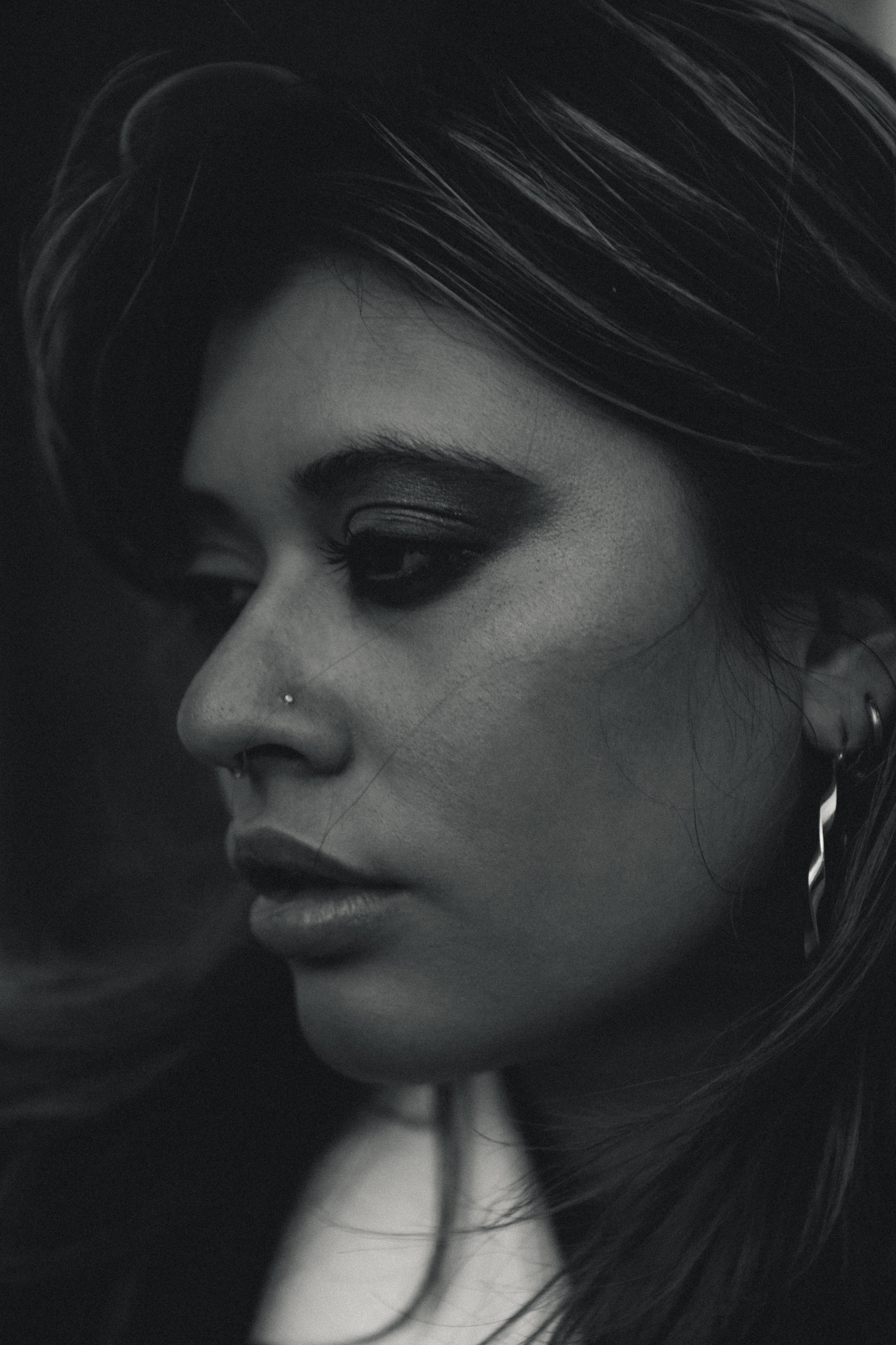 Moody Portrait of a Woman in Black and White · Free Stock Photo