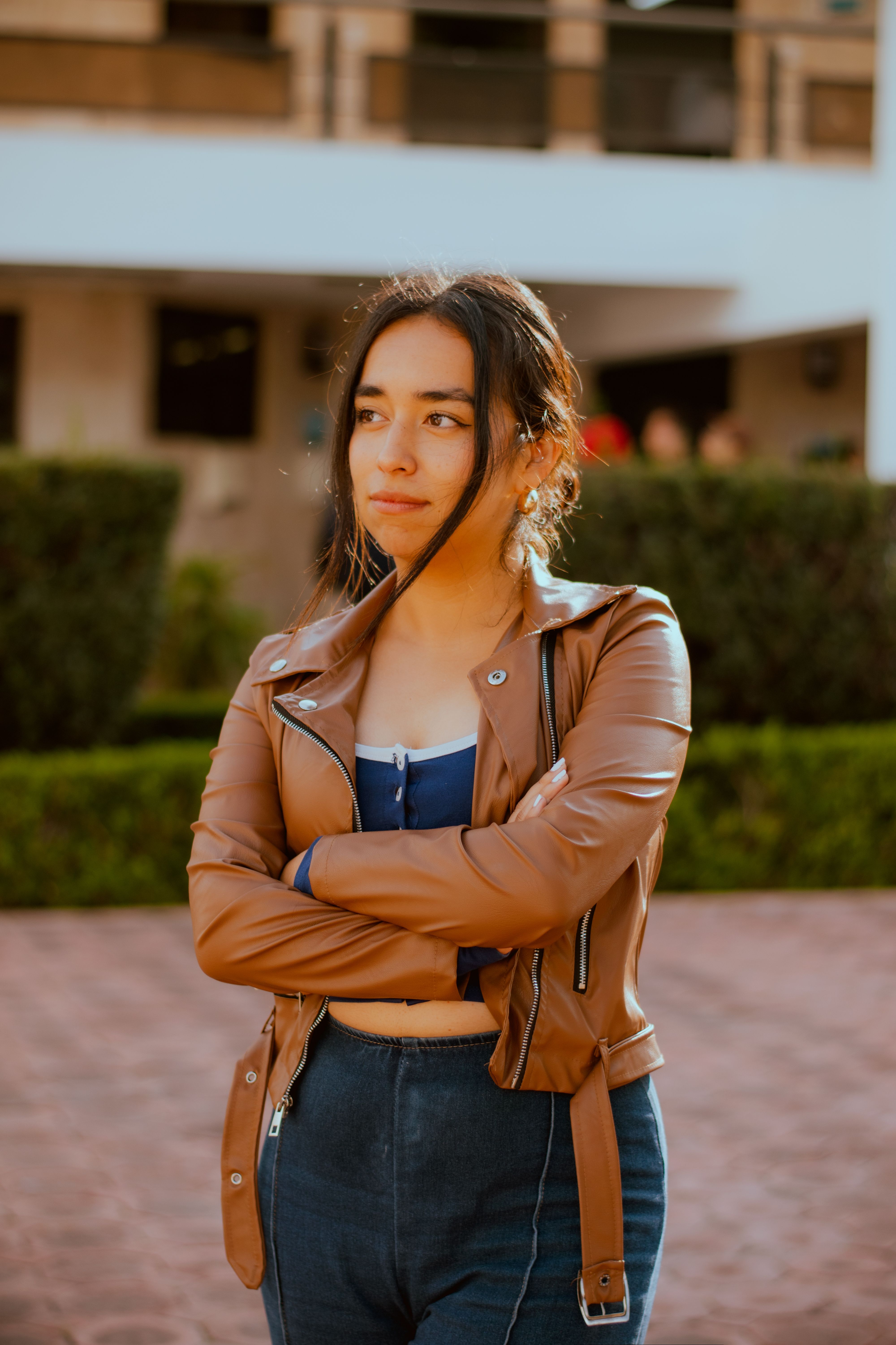 Young Woman in Leather Jacket Outdoors · Free Stock Photo