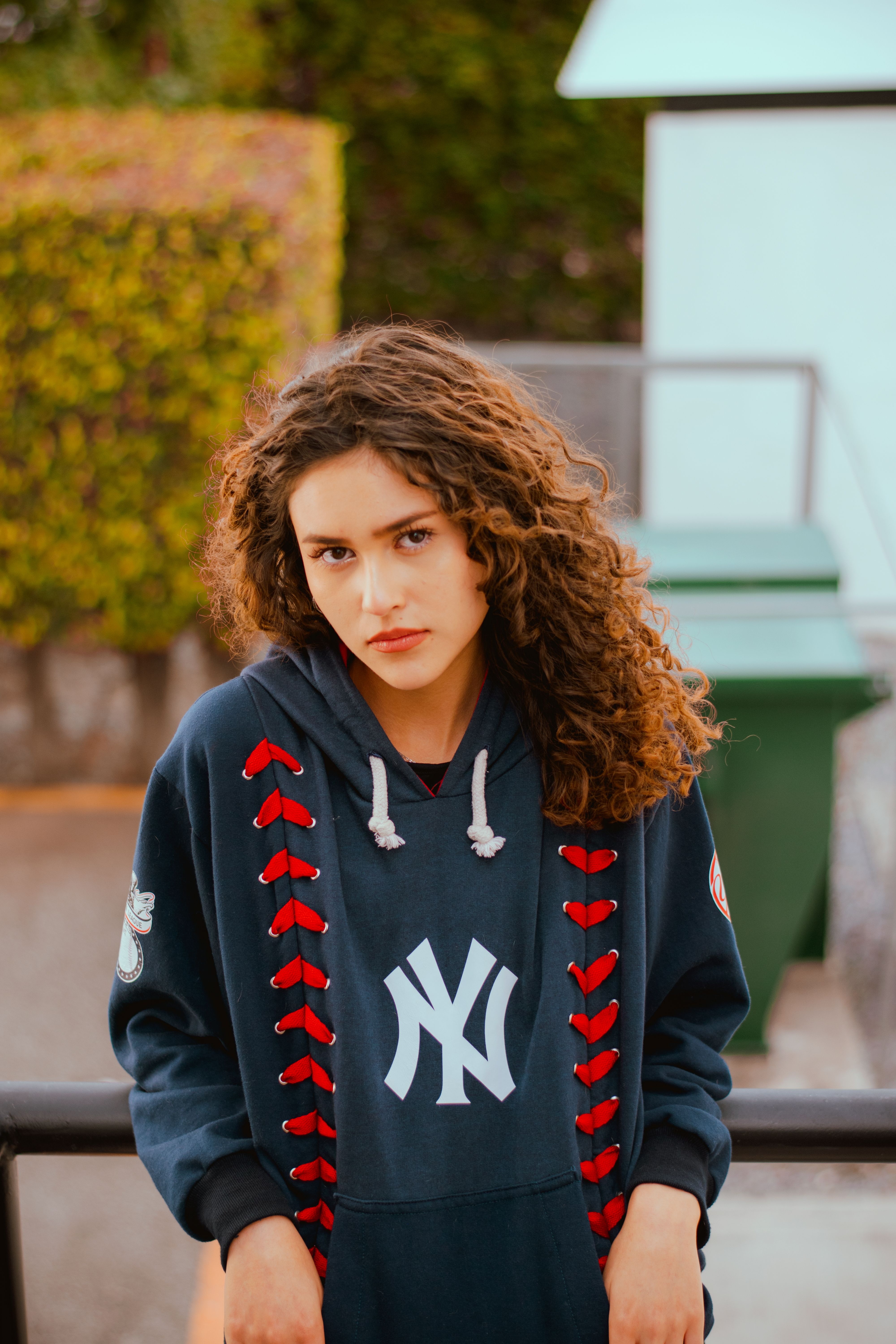 Portrait of a Young Woman in Urban Setting · Free Stock Photo