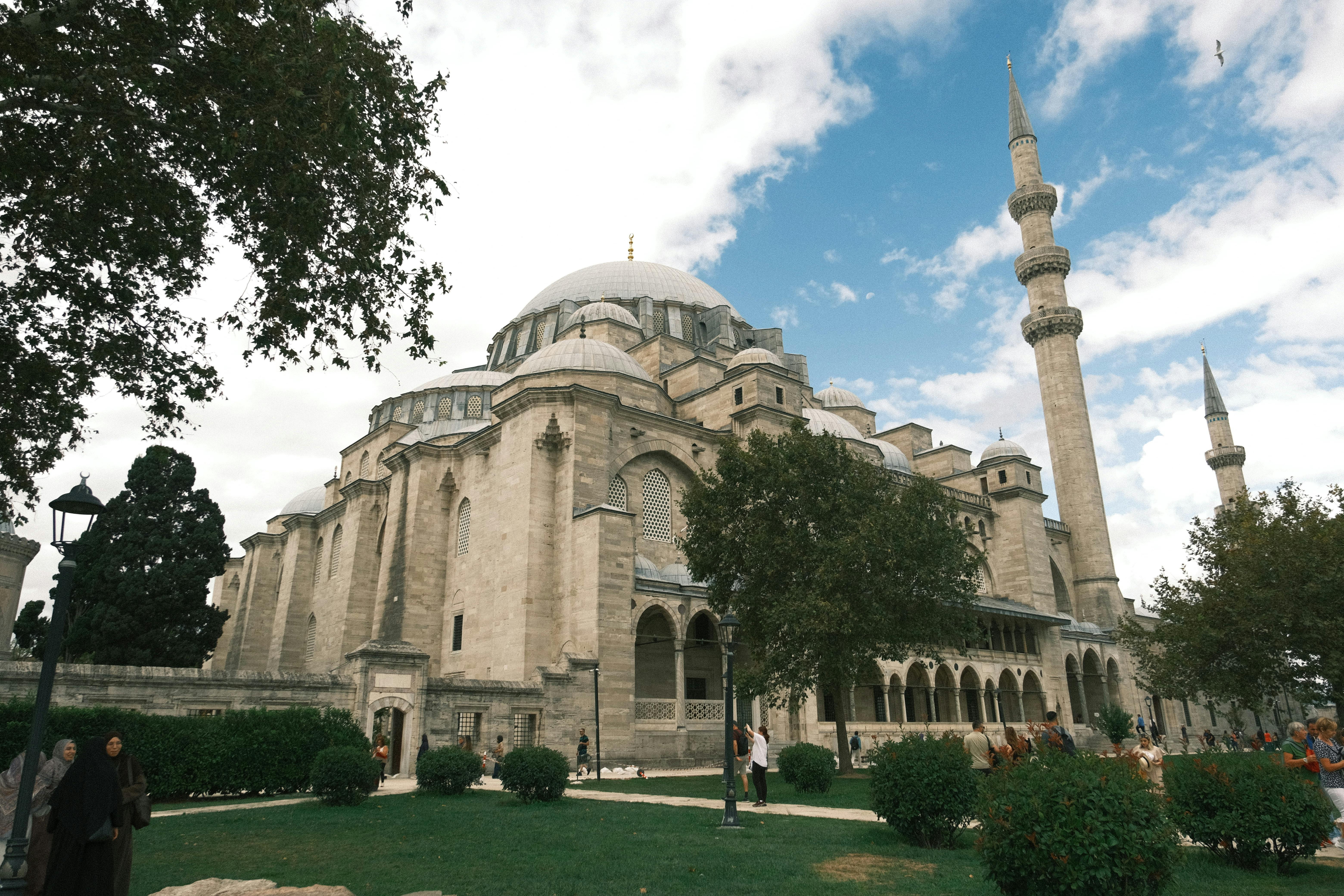 Süleymaniye Mosque at sunrise with majestic dome and four minarets, Istanbul skyline, Golden Horn view, Ottoman architecture