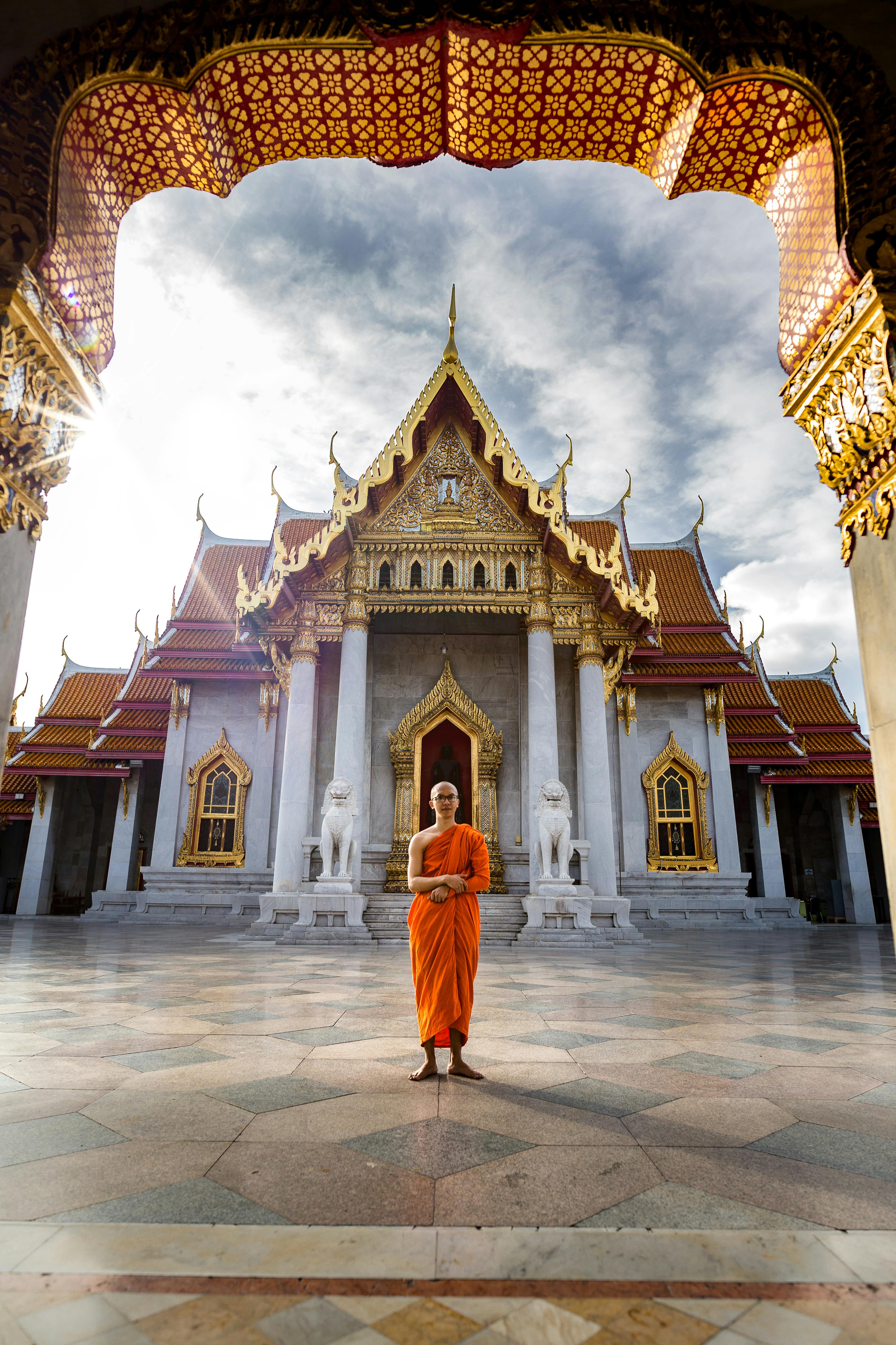 man standing outside a prayer temple