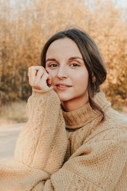 Free Woman Wearing Brown Long-sleeved Sweater Stock Photo