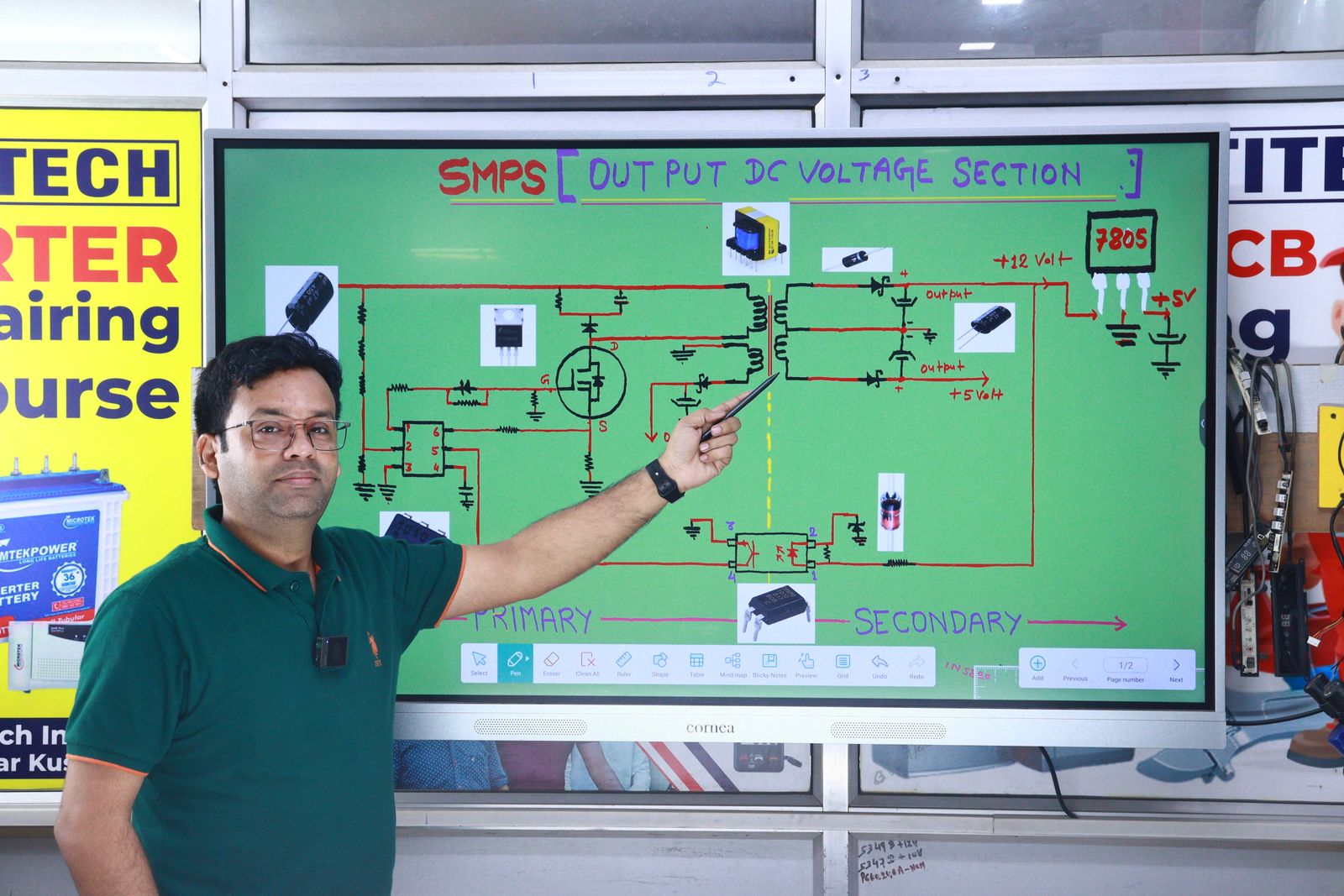 Instructor teaching an electronics repair course