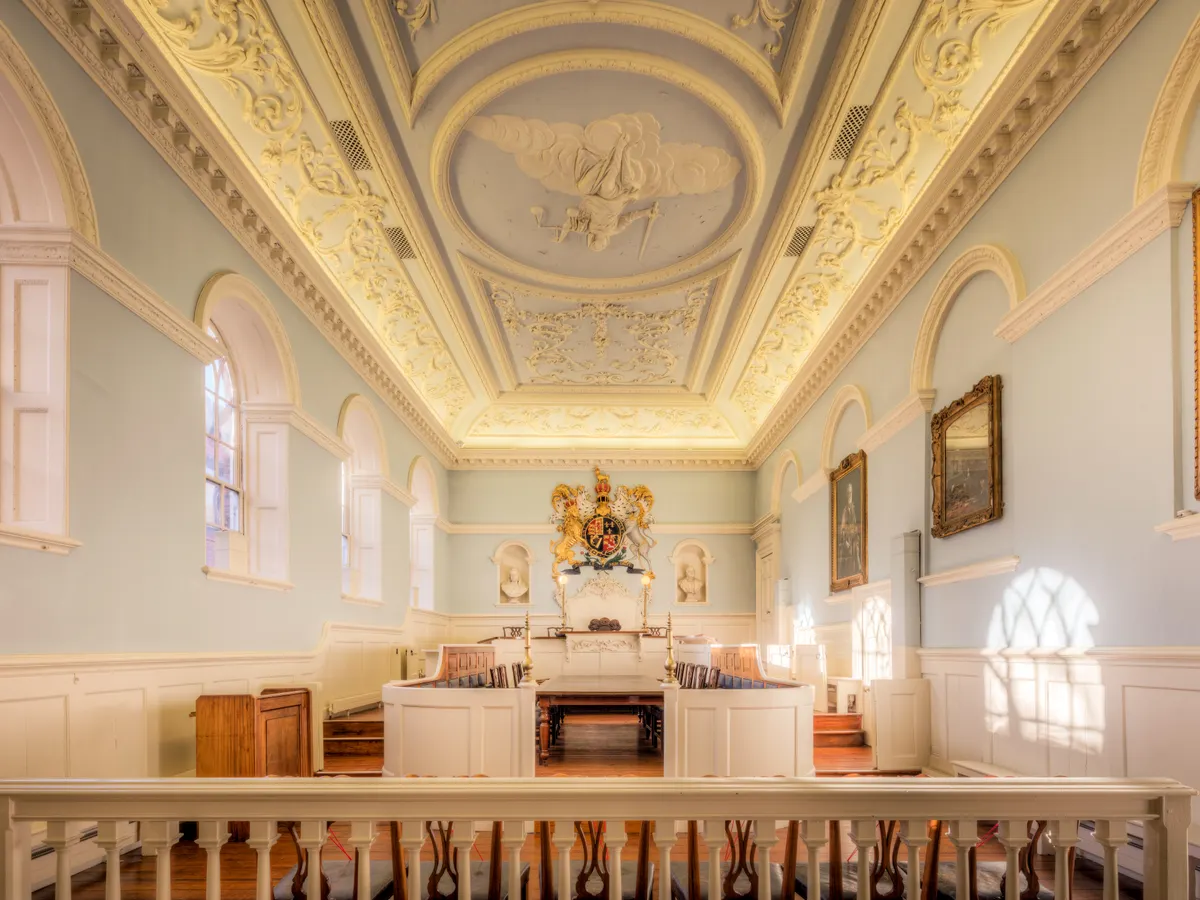 A courtroom scene illustrating property litigation. alt_text: