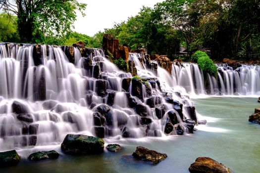 Explore the serene beauty of Giang Điền Waterfall, nestled in Đồng Nai, Vietnam.