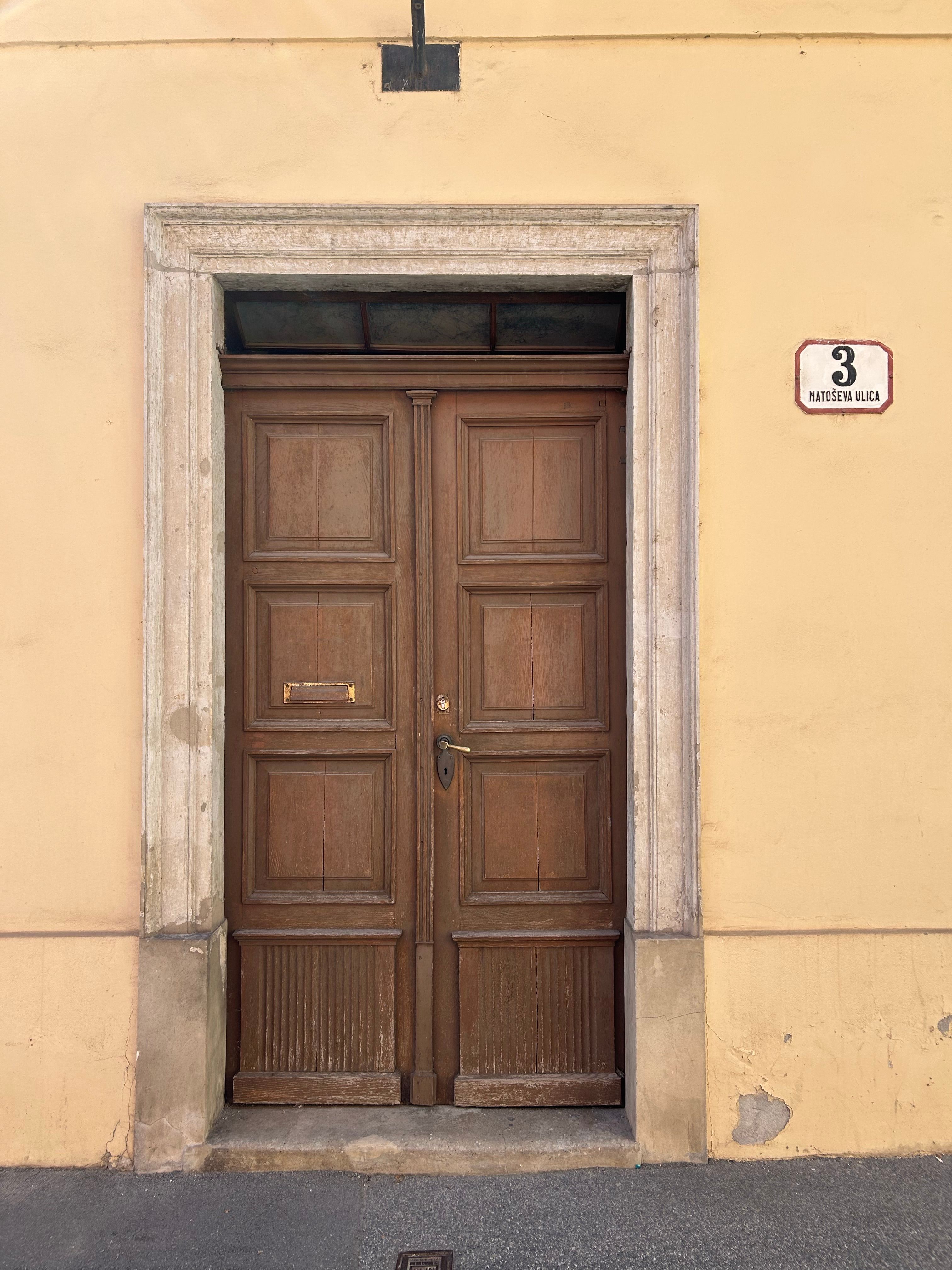 A classic wooden door in Zagreb beautifully captures historic charm and architectural detail.