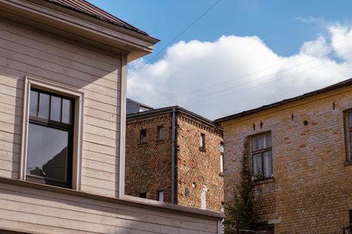 Free Quaint view of historic brick architecture in Riga, Latvia under a vivid blue sky. Stock Photo