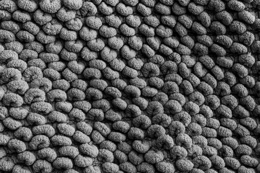 Detailed black and white photo of textured fabric for design background
