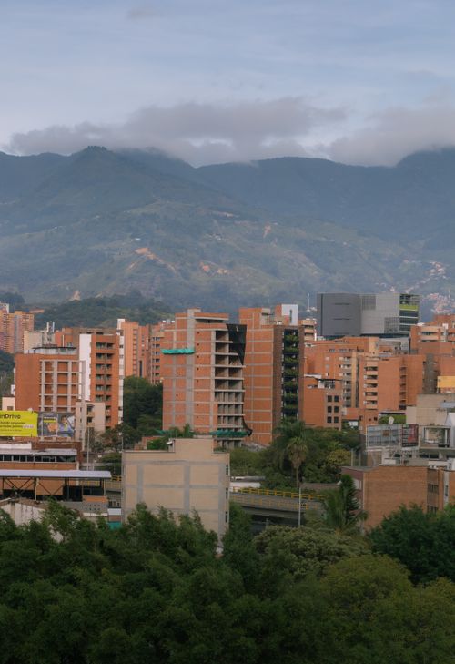 Free Captivating view of Medellín's urban skyline set against lush mountains in Antioquia, Colombia. Stock Photo