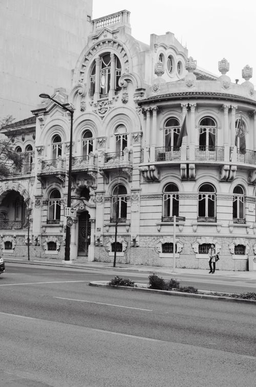 Free Elegant European-style building captured in monochrome, showcasing intricate architectural details. Stock Photo