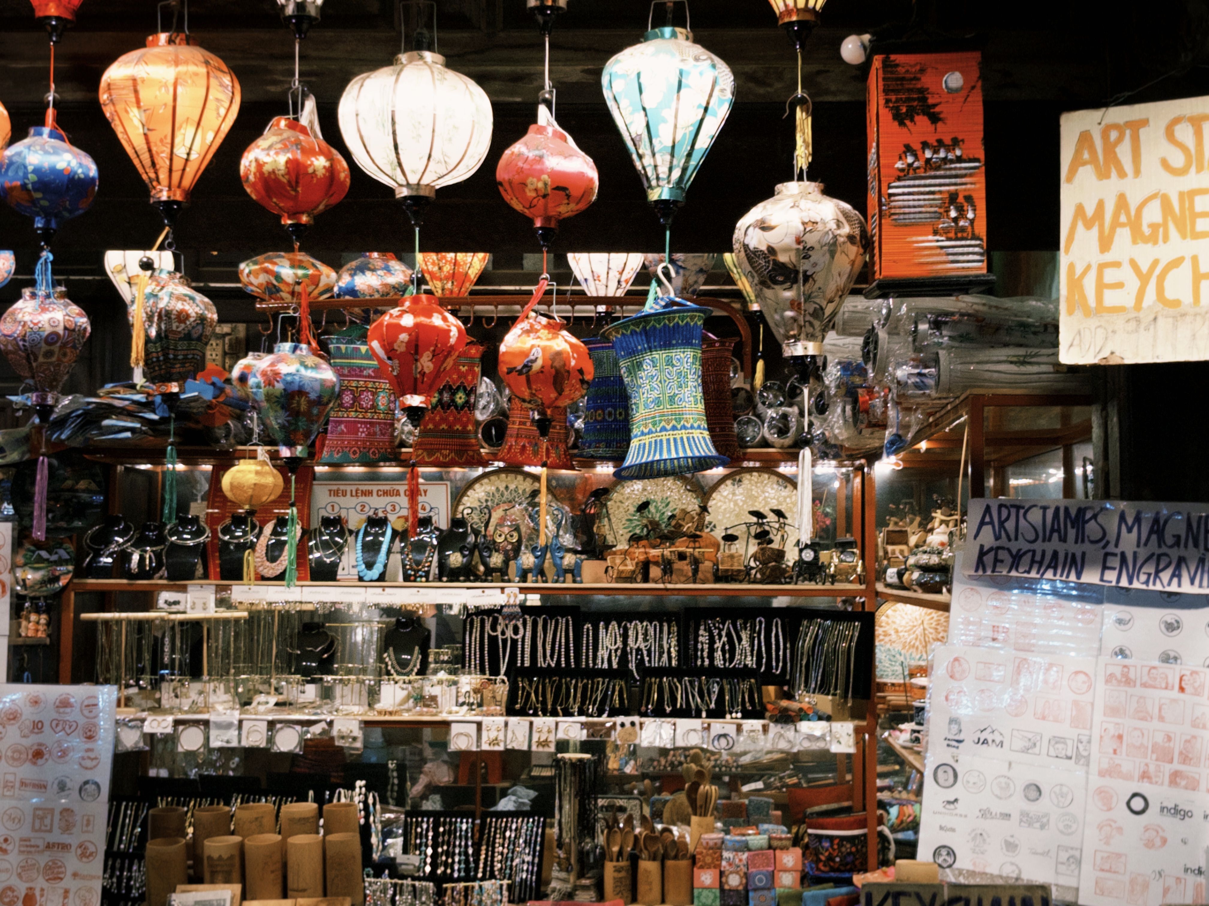 Vibrant Asian Market Stall with Hanging Lanterns · Free Stock Photo