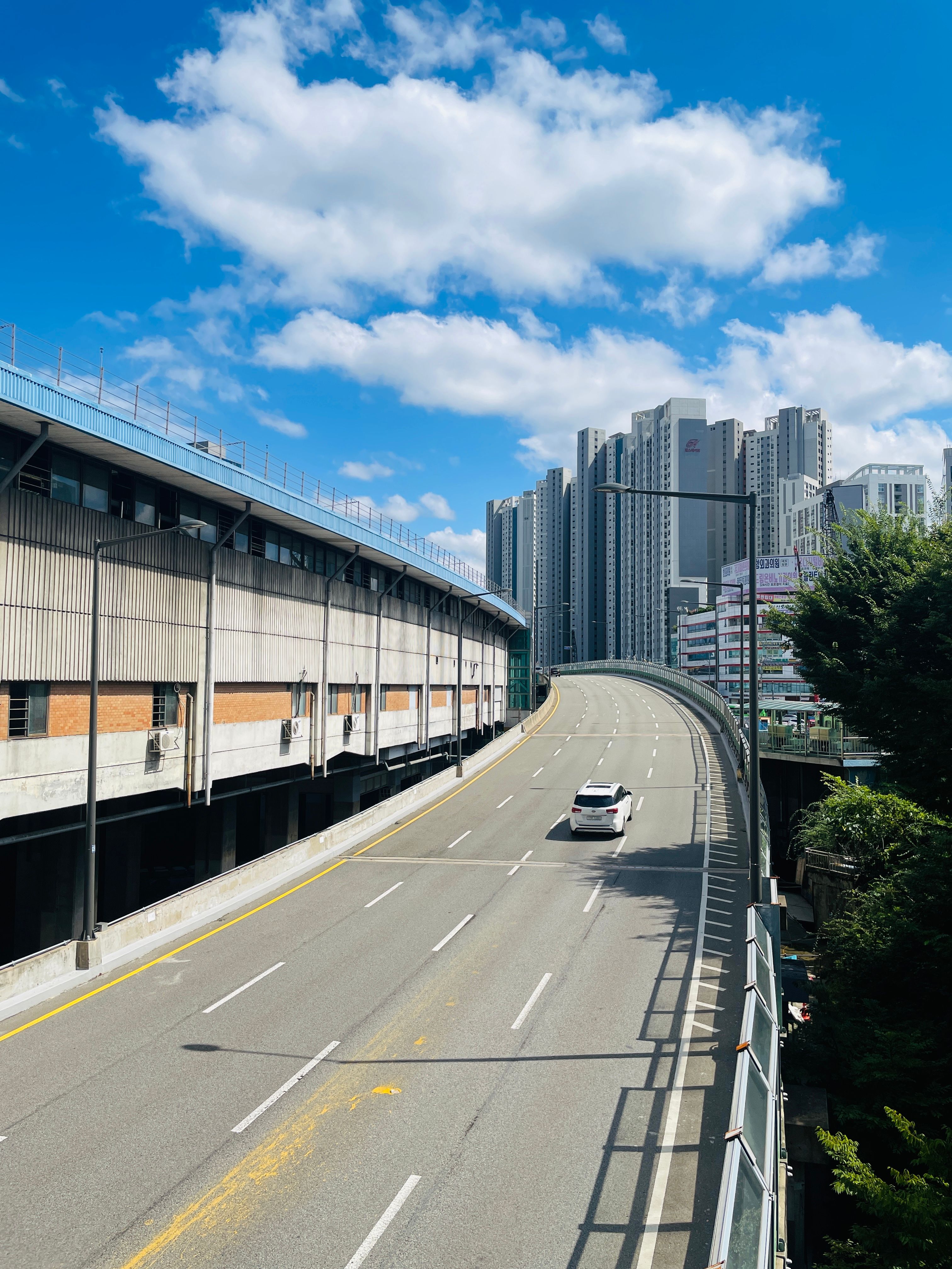 sunny day urban highway in seoul with skyscrapers