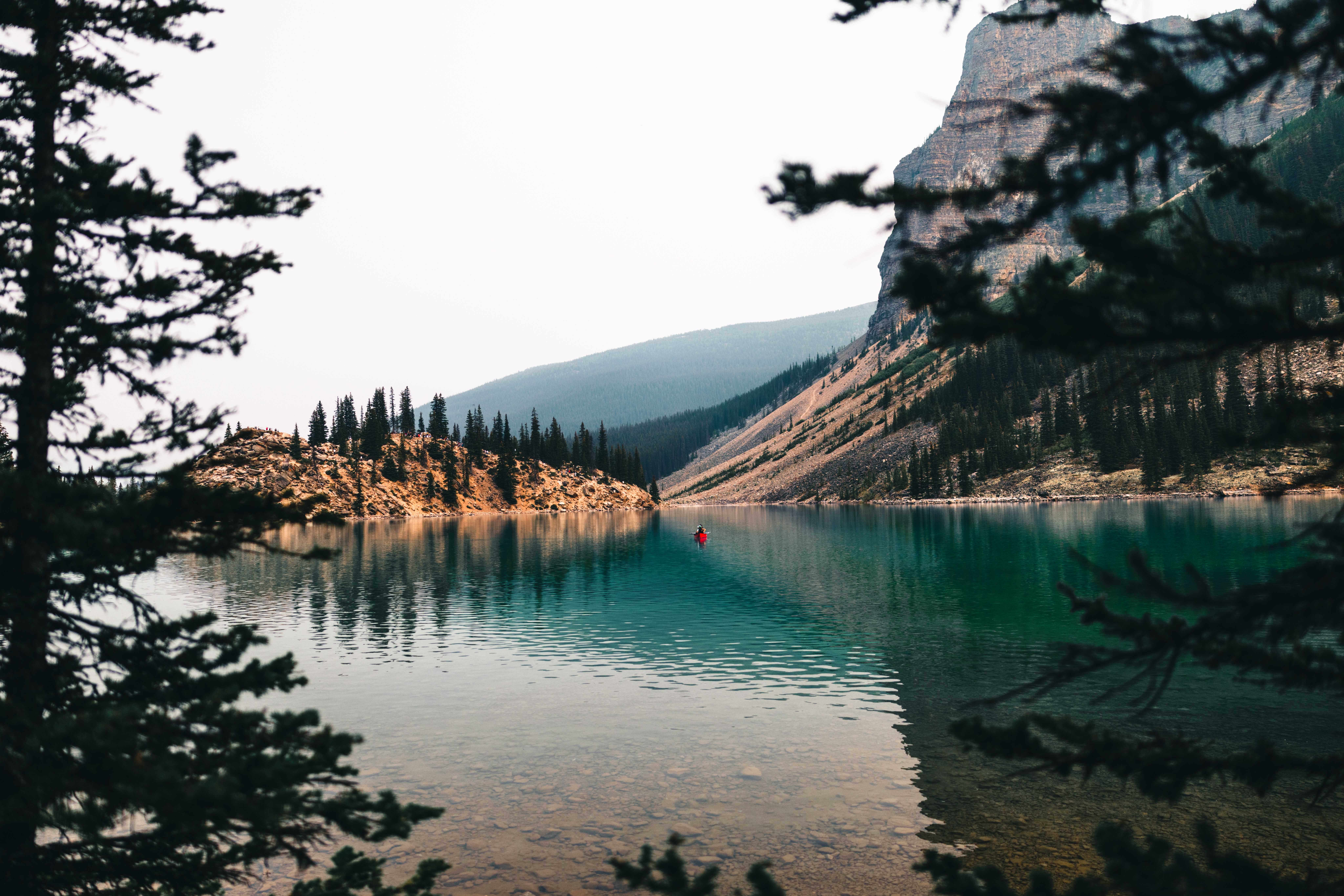 Idyllic view of a tranquil lake surrounded by mountains in Alberta, Canada.