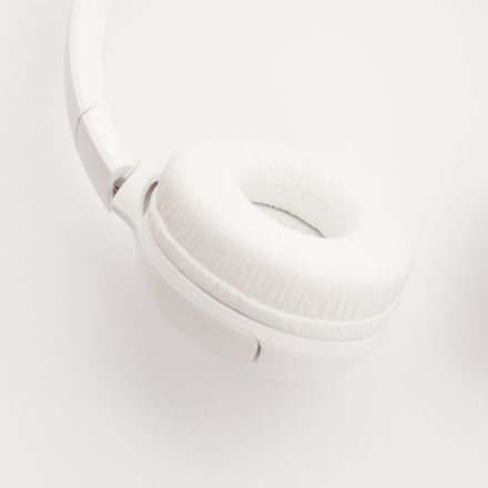 White over-ear headphone cushion close-up — photo by Sound On on Pexels