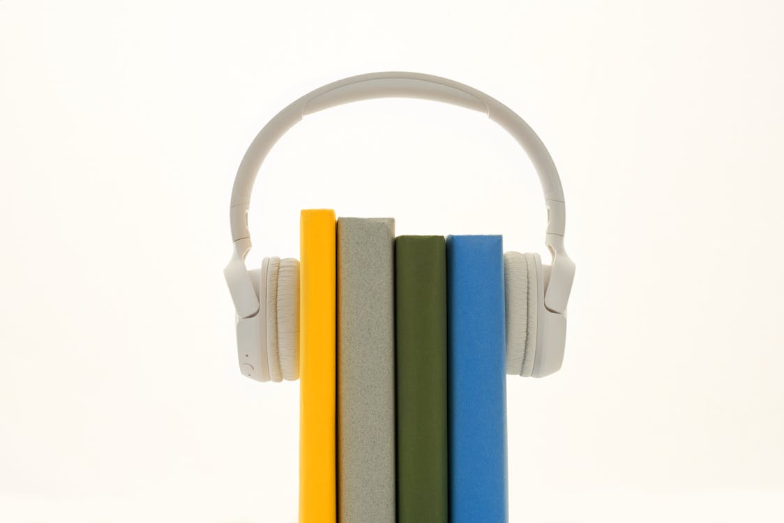 Free Books Between Headphones Stock Photo