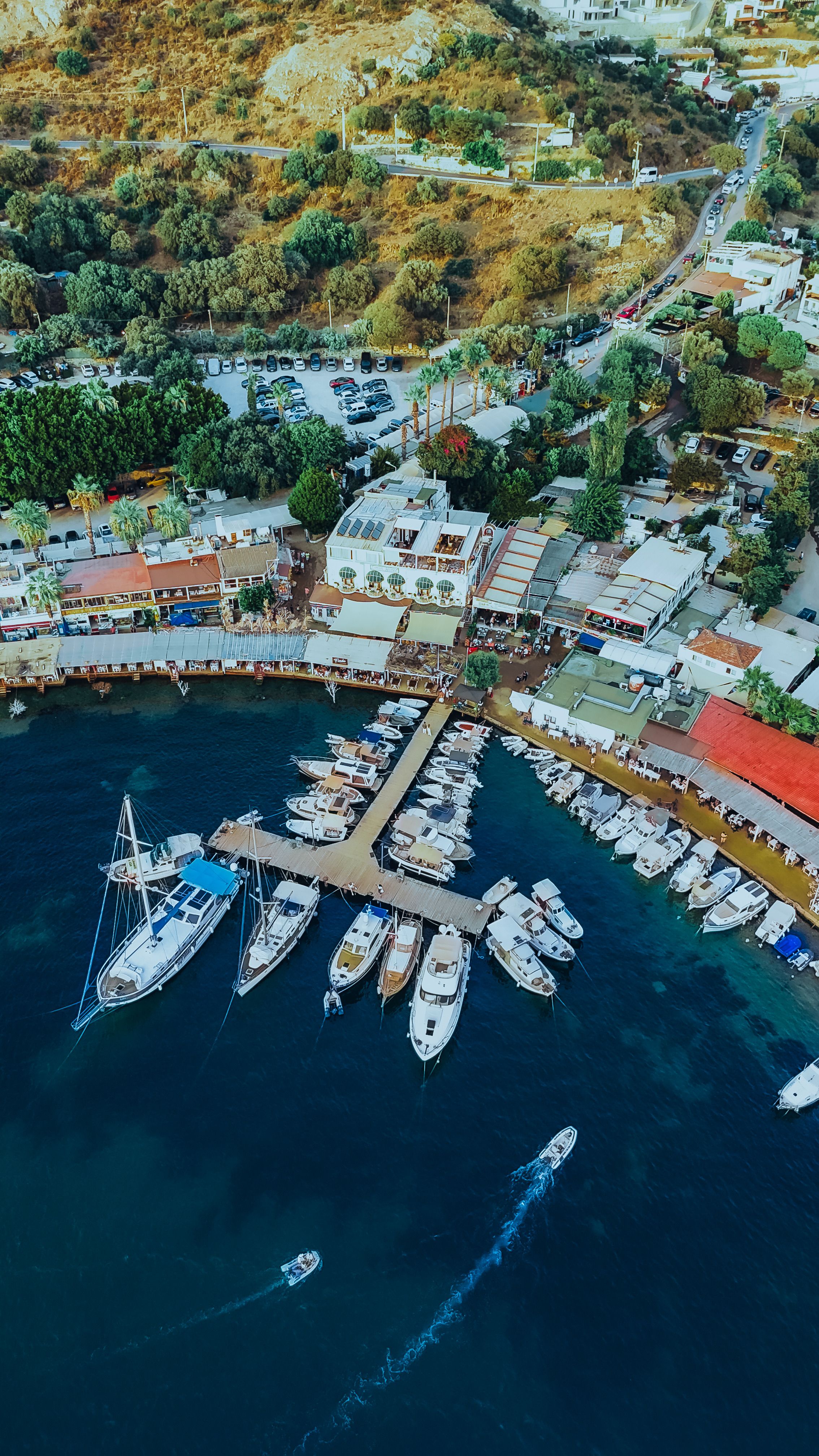 Scenic Aerial View of Coastal Town and Marina · Free Stock Photo